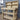 Indoor/Outdoor Pressure-Treated Double Shelf with back panel Workbench, a robust and versatile solution for all your workspace needs. Handcrafted in the UK, this workbench is constructed from high-quality, pressure-treated timber, ensuring durability and resistance to the elements, making it suitable for both indoor and outdoor use.