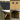 Collage of a wooden shed with a metal roof, showing different angles and details.