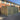 Wooden storage unit in front of a brick building